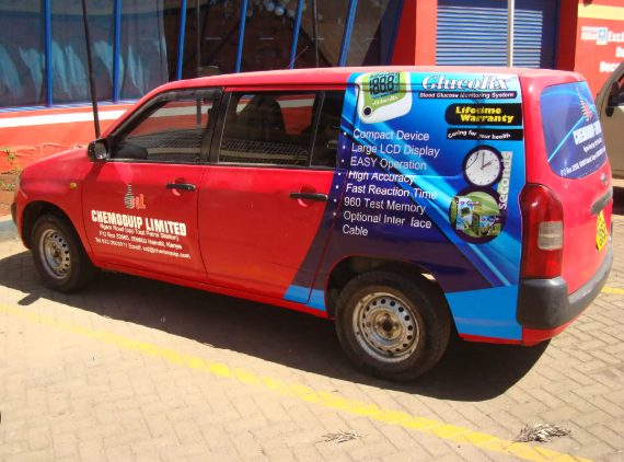 Compact car with full vehicle branding wrap for a medical device brand